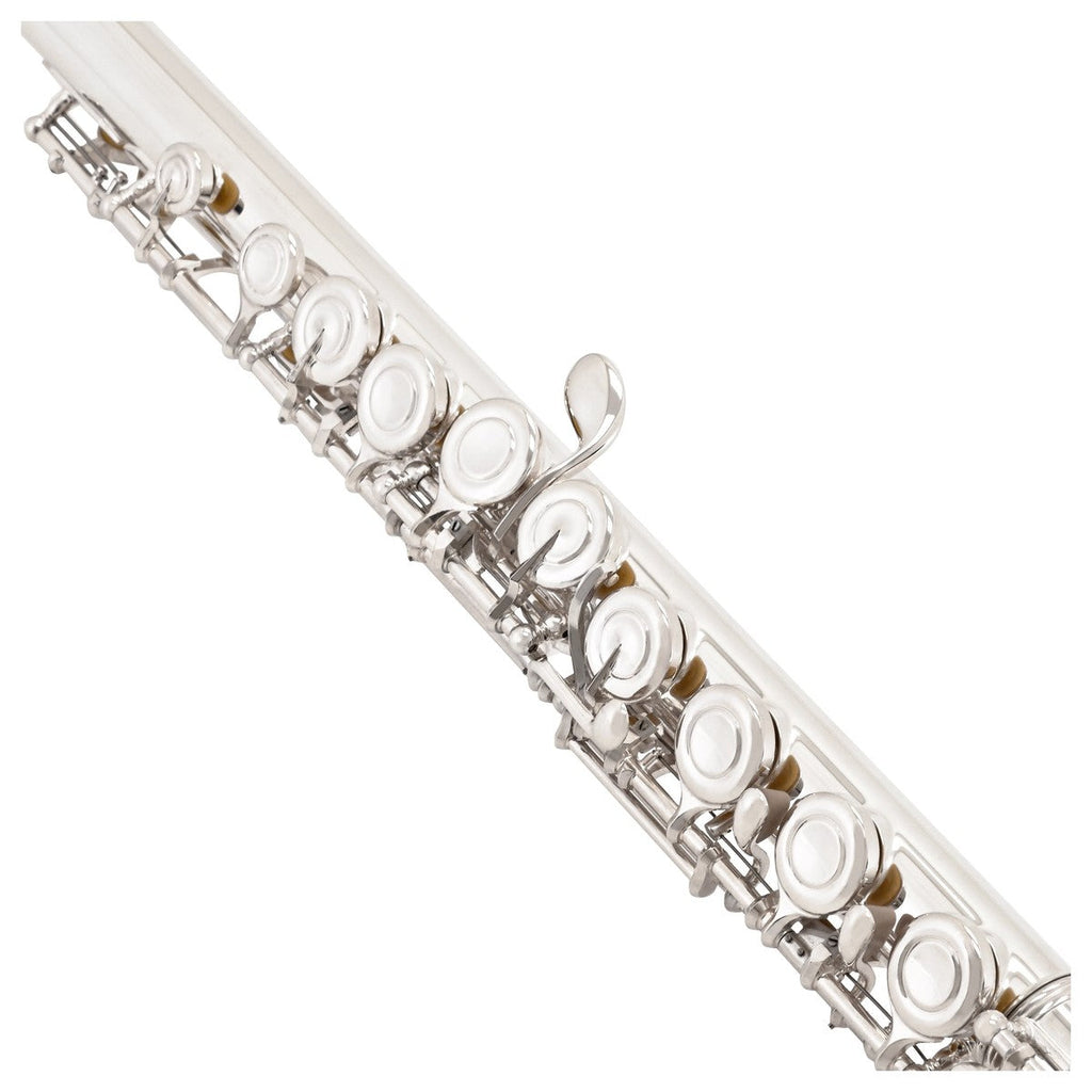 Close-up of the Yamaha YFL-212 Student Flute, displaying its detailed metalwork and round key pads against a white background.